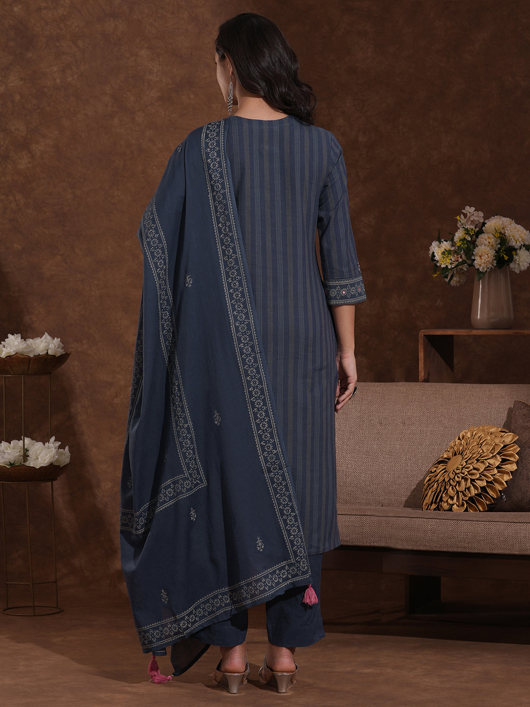 Straight fit kurta with mirror work paired with solid pant and printed dupatta.