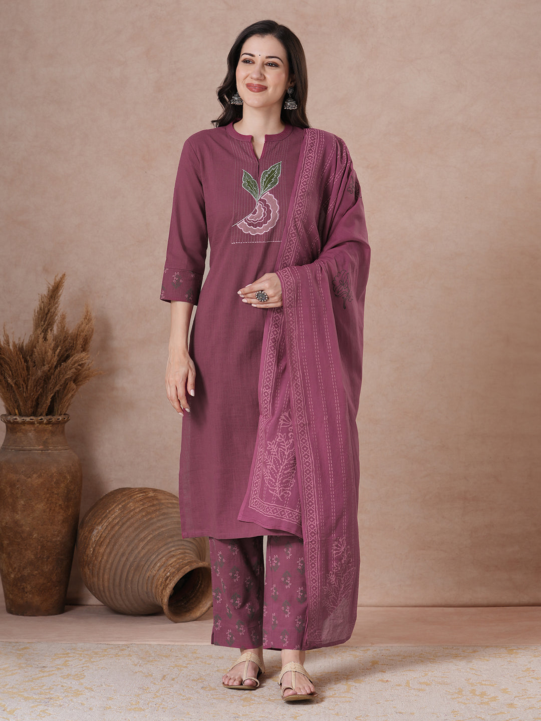 Magenta Applique Yoke Kurta Set with floral printed pants.