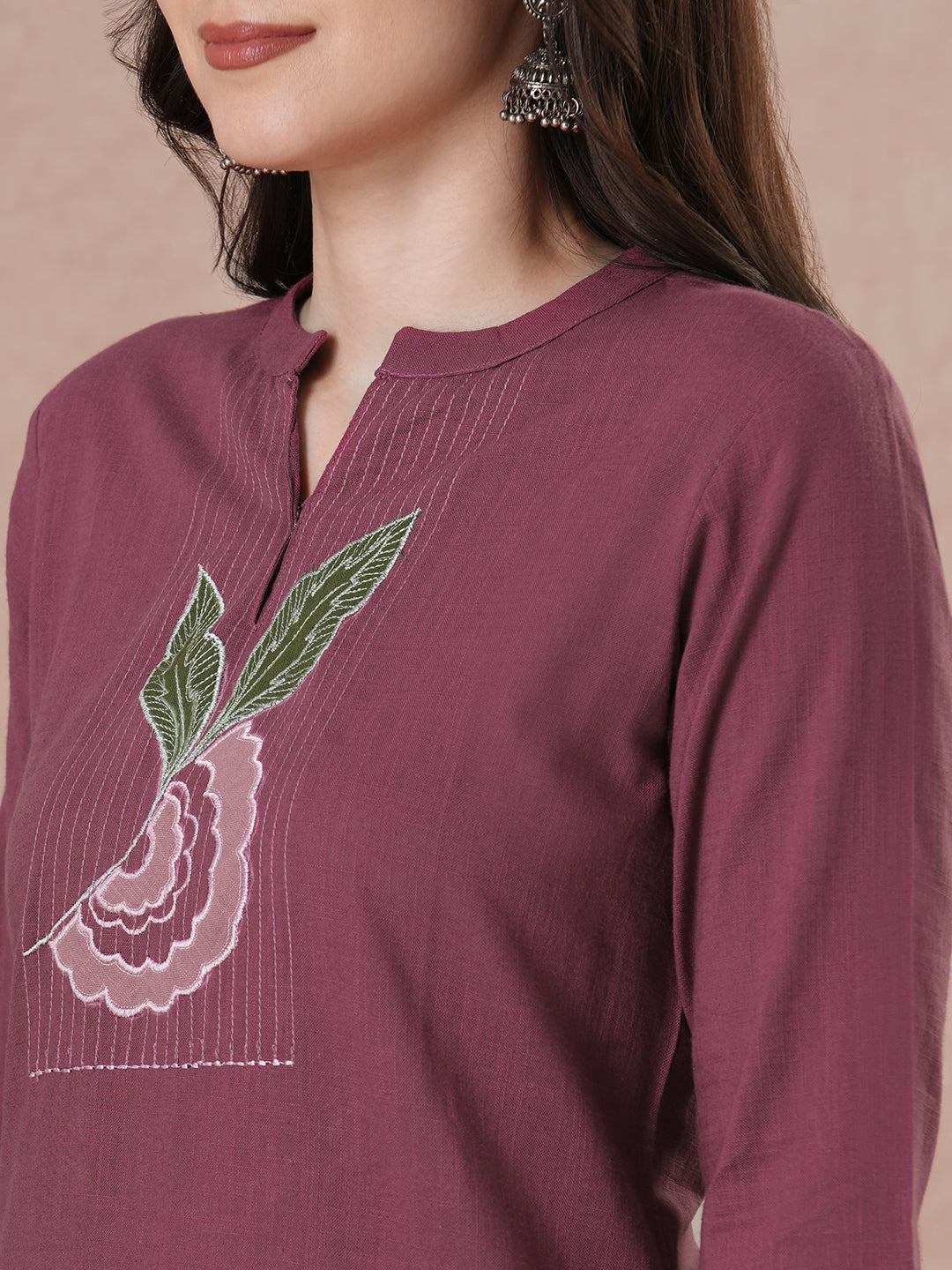 Magenta Applique Yoke Kurta Set with floral printed pants.