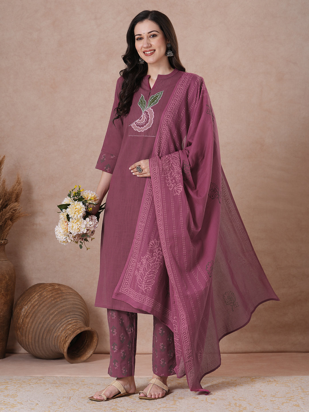 Magenta Applique Yoke Kurta Set with floral printed pants.