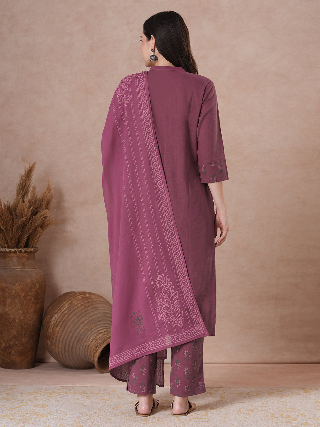 Magenta Applique Yoke Kurta Set with floral printed pants.