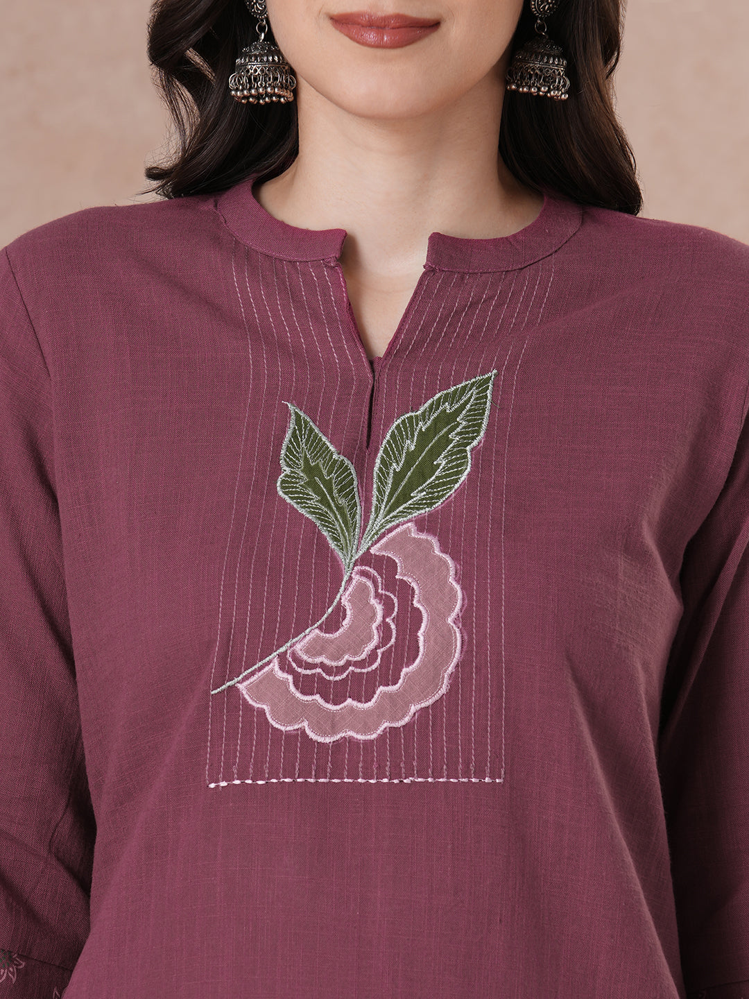 Magenta Applique Yoke Kurta Set with floral printed pants.