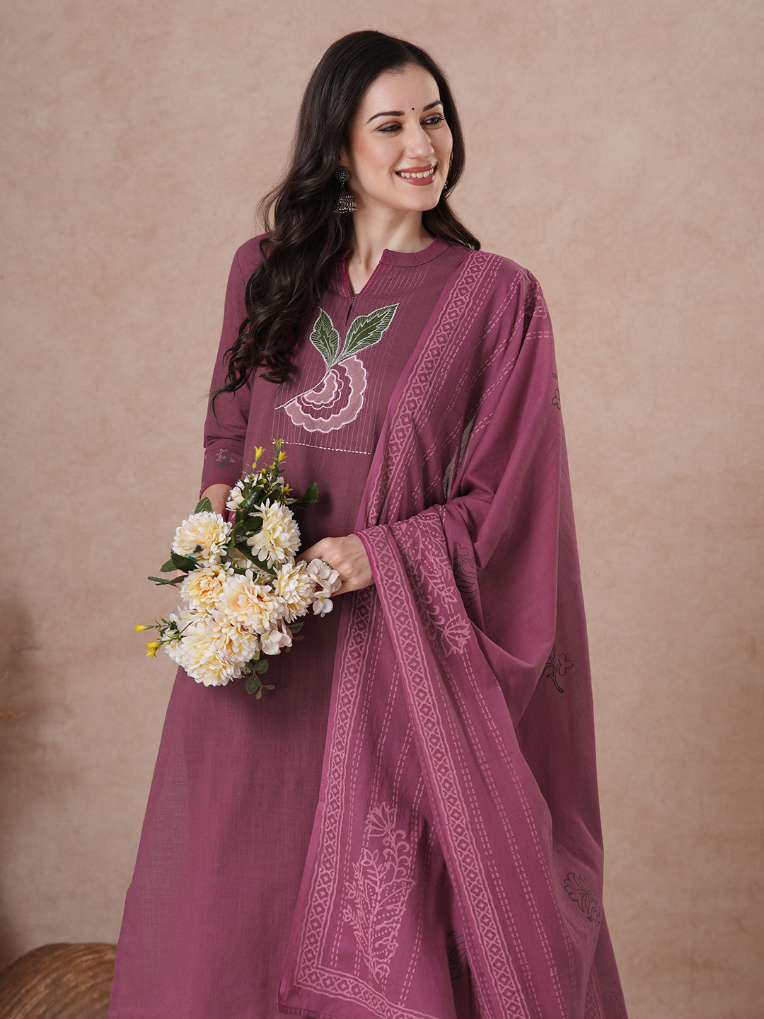 Magenta Applique Yoke Kurta Set with floral printed pants.