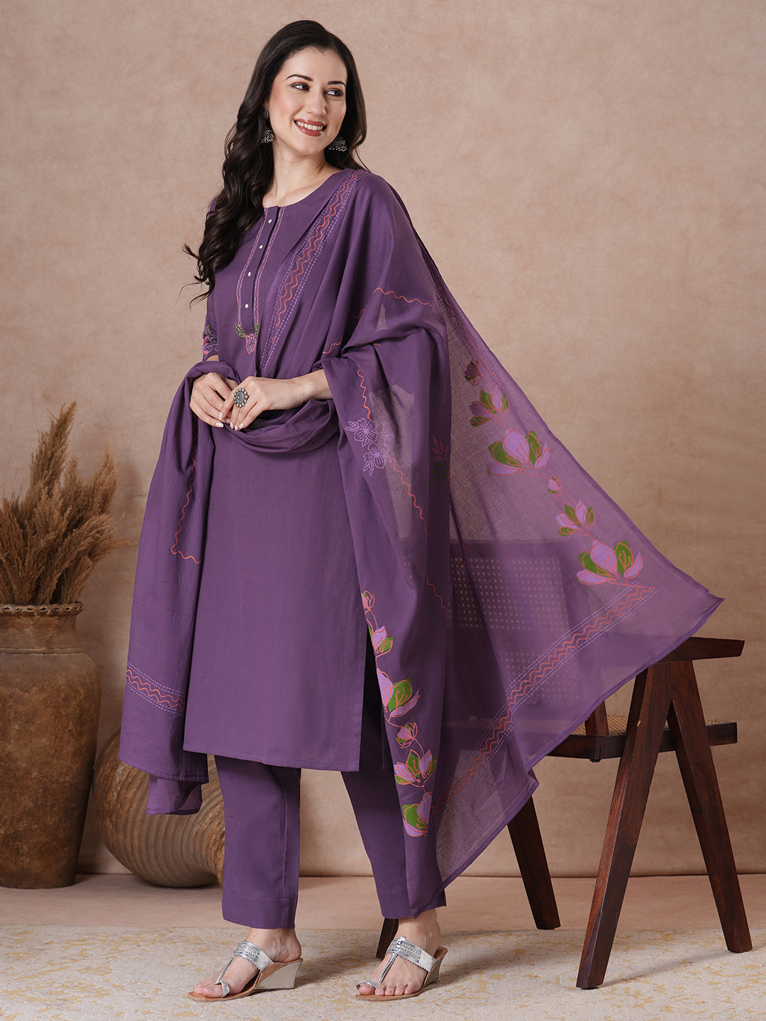 Purple Floral Embroidered Kurta Set with elegant wavy border Dupatta.