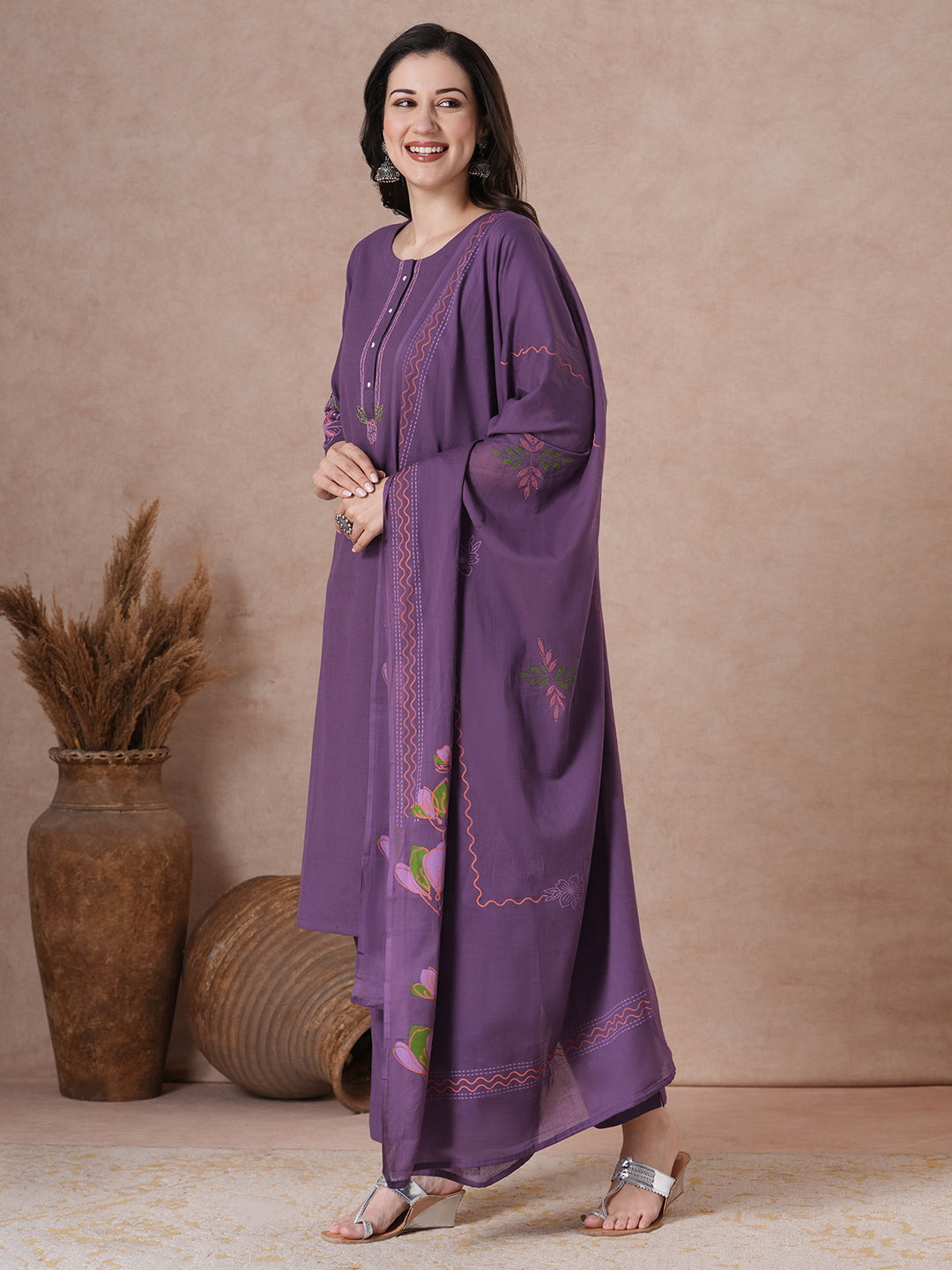 Purple Floral Embroidered Kurta Set with elegant wavy border Dupatta.
