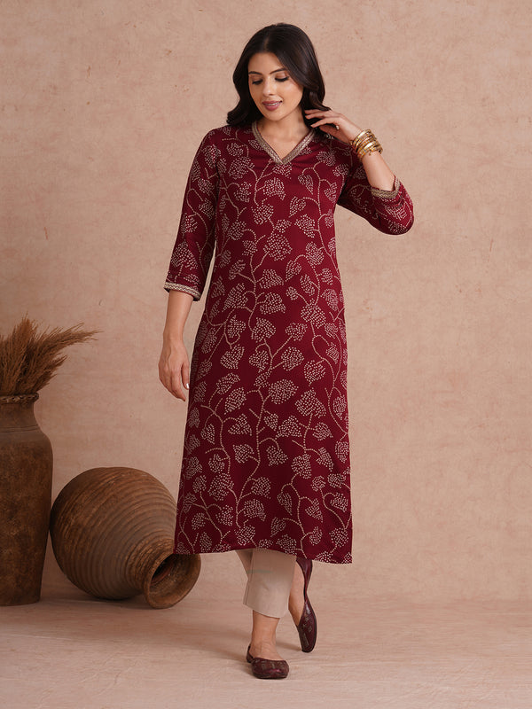 Straight fit kurta in printed gajji satin with embroidered neck and sleeve border.
