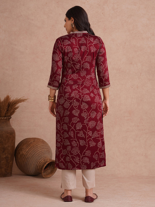 Straight fit kurta in printed gajji satin with embroidered neck and sleeve border.