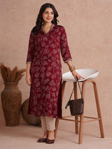 Straight fit kurta in printed gajji satin with embroidered neck and sleeve border.