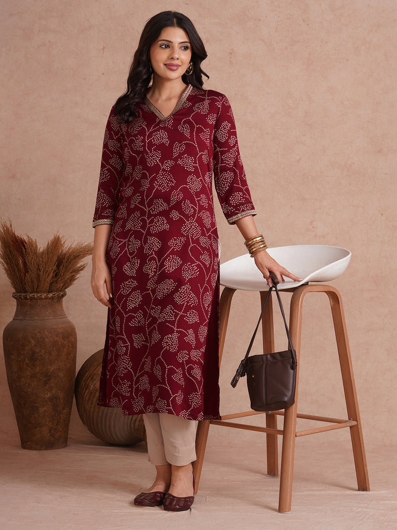 Straight fit kurta in printed gajji satin with embroidered neck and sleeve border.