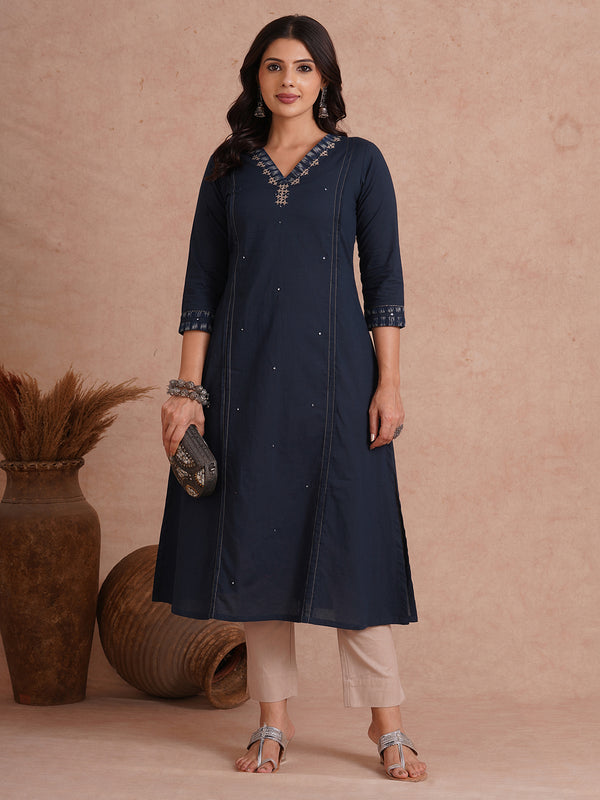 Pocketed A-Line cotton kurta with traditional 'chatakla' embroidery and mirror work.