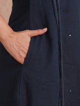 Pocketed A-Line cotton kurta with traditional 'chatakla' embroidery and mirror work.