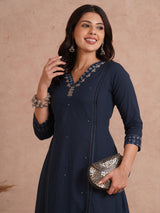 Pocketed A-Line cotton kurta with traditional 'chatakla' embroidery and mirror work.