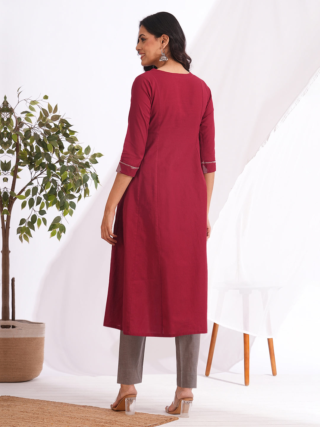 Pocketed A-line cotton kurta with a printed centre panel and hand work detailing (Maroon)