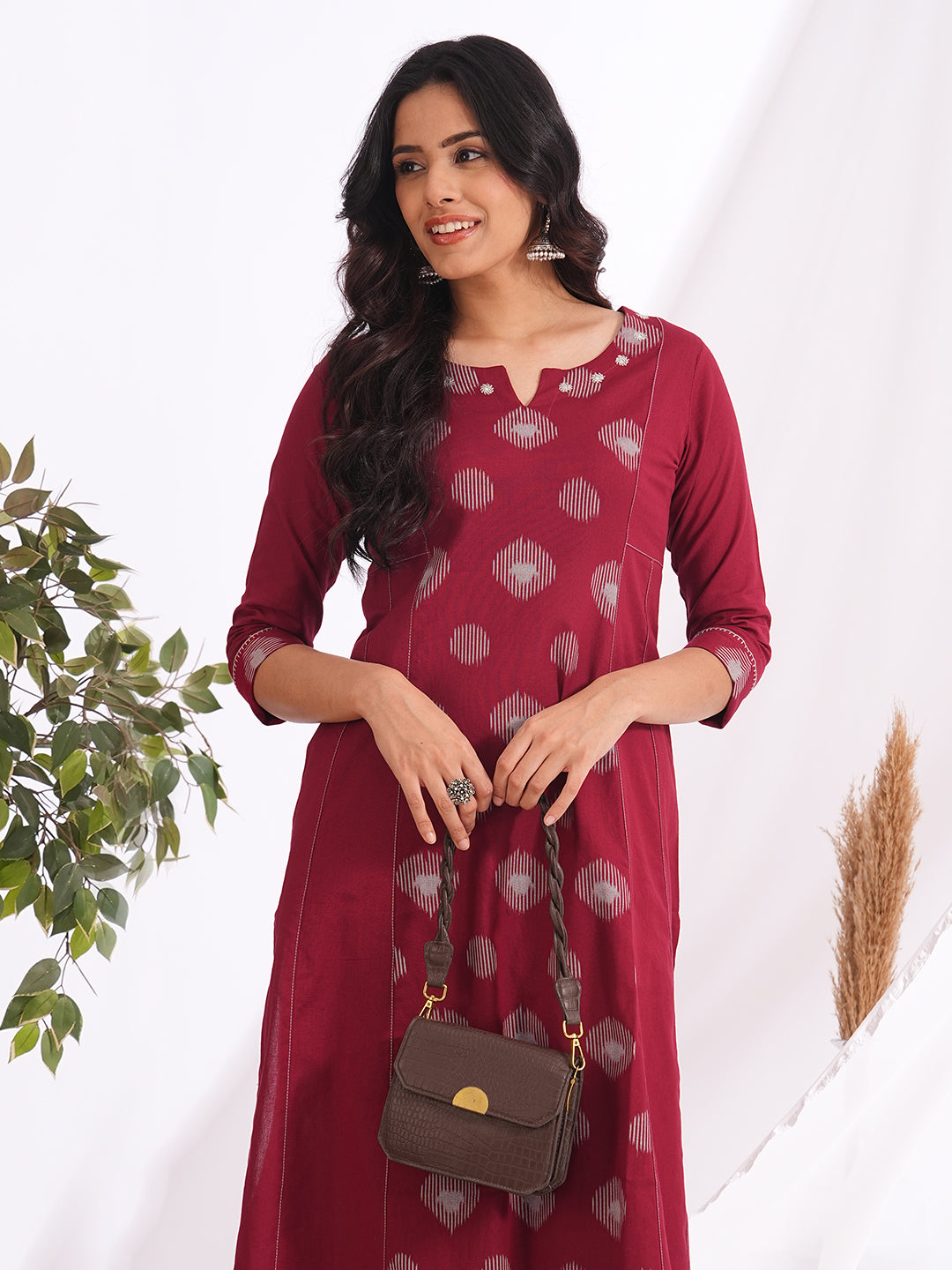 Pocketed A-line cotton kurta with a printed centre panel and hand work detailing (Maroon)
