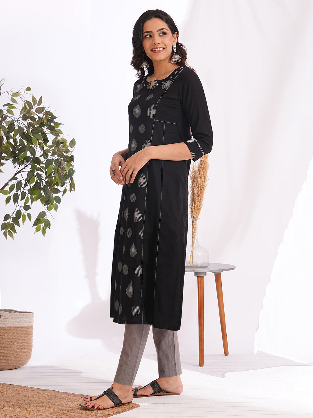 Pocketed A-line cotton kurta with a printed centre panel and hand work detailing (Black)