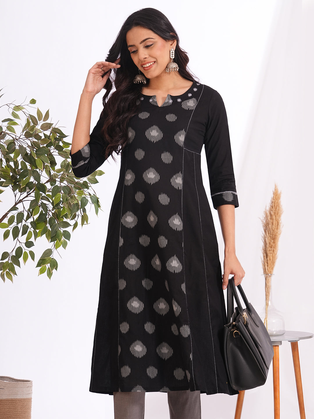 Pocketed A-line cotton kurta with a printed centre panel and hand work detailing (Black)