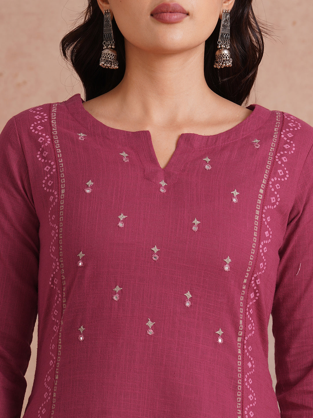 A-Line fit cotton slurb kurta with hand embroidery, block print and an inseam pocket.