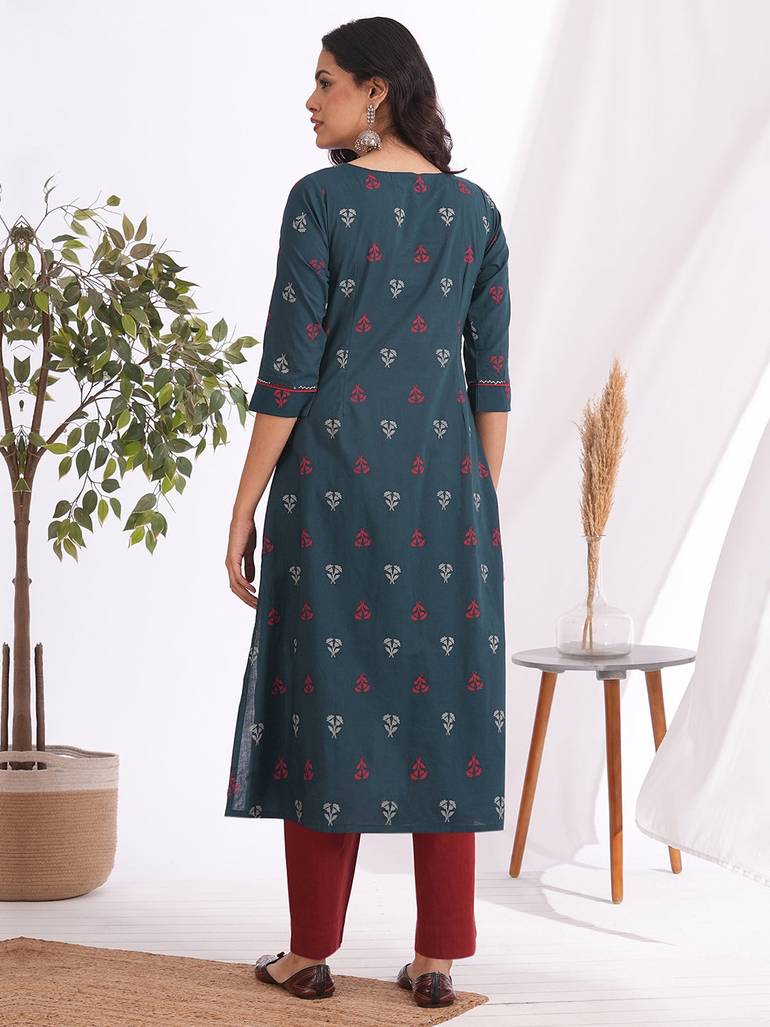A-line pleated kurta with an printed cotton fabric with hand embroidery and pocket