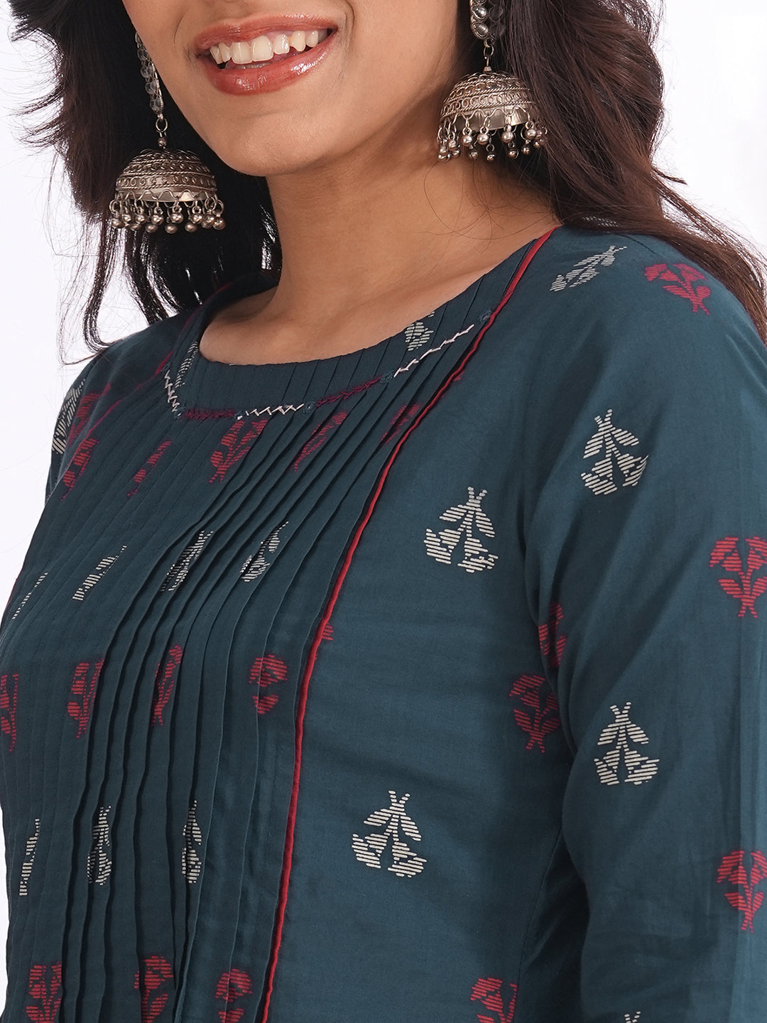 A-line pleated kurta with an printed cotton fabric with hand embroidery and pocket