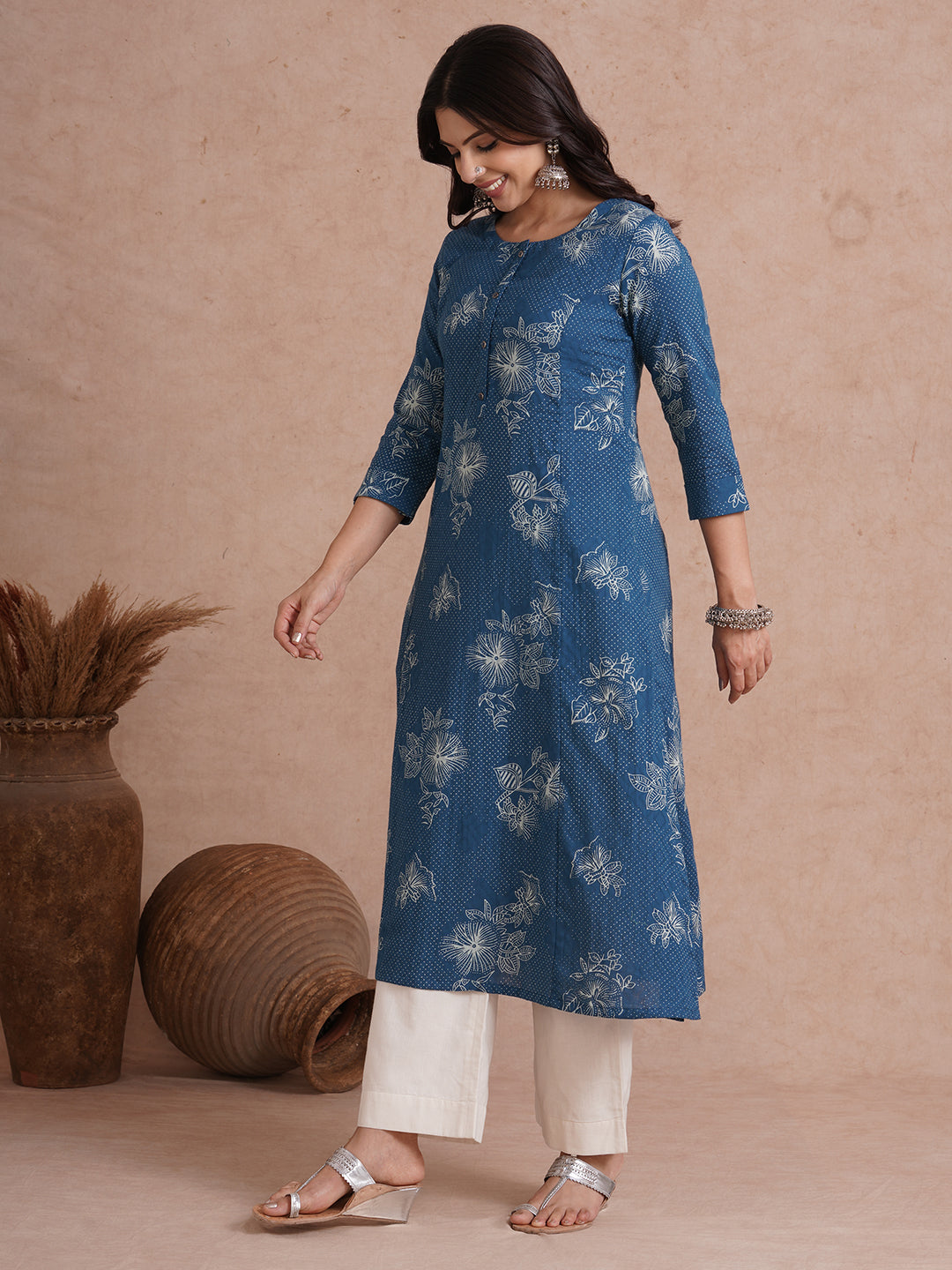 A-Line kurta with an in seam pocket and centre placket on printed cotton jacquard fabric.