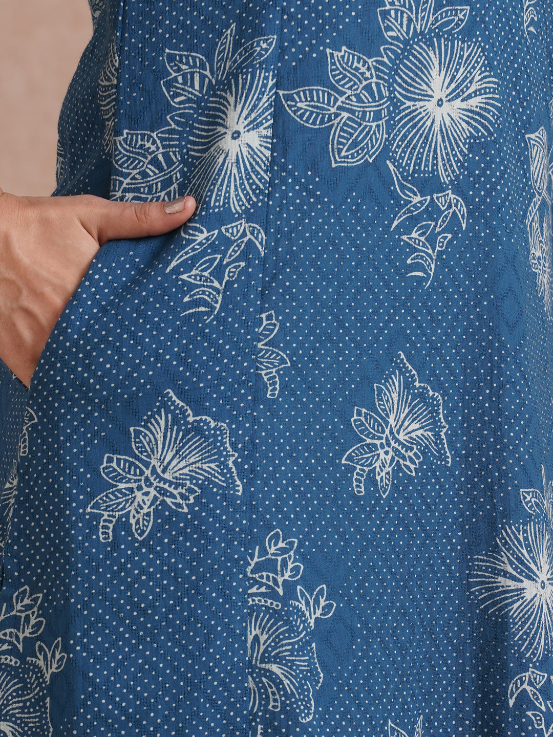 A-Line kurta with an in seam pocket and centre placket on printed cotton jacquard fabric.