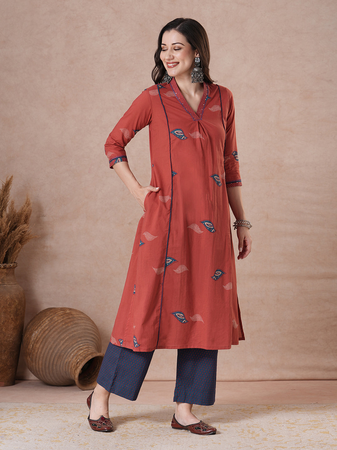 Women Printed A-Line Kurta with Hand Embroidery and Box Pleat Detail.