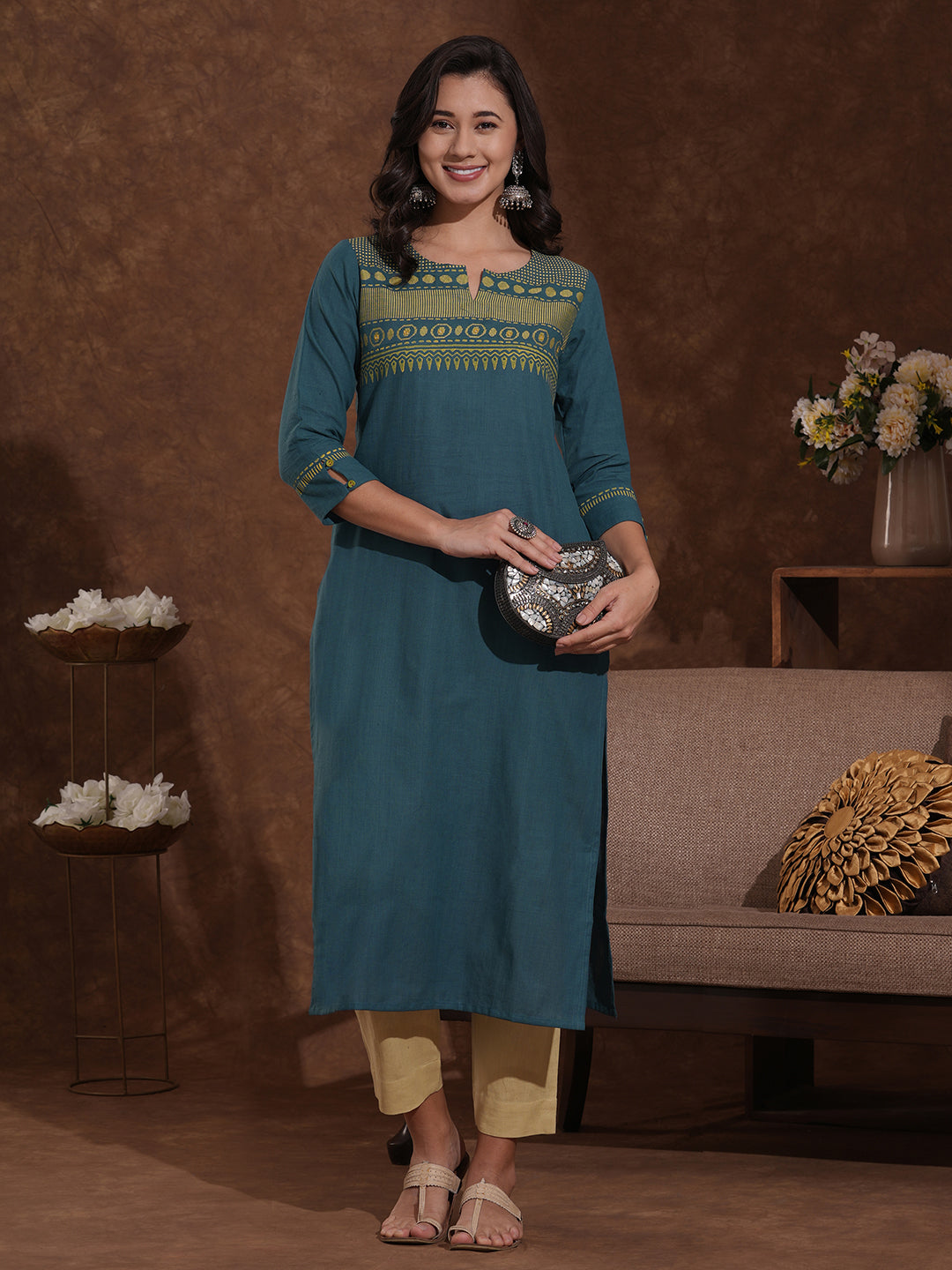 Straight fit woven cotton kurta in azure blue shade with mirror work.