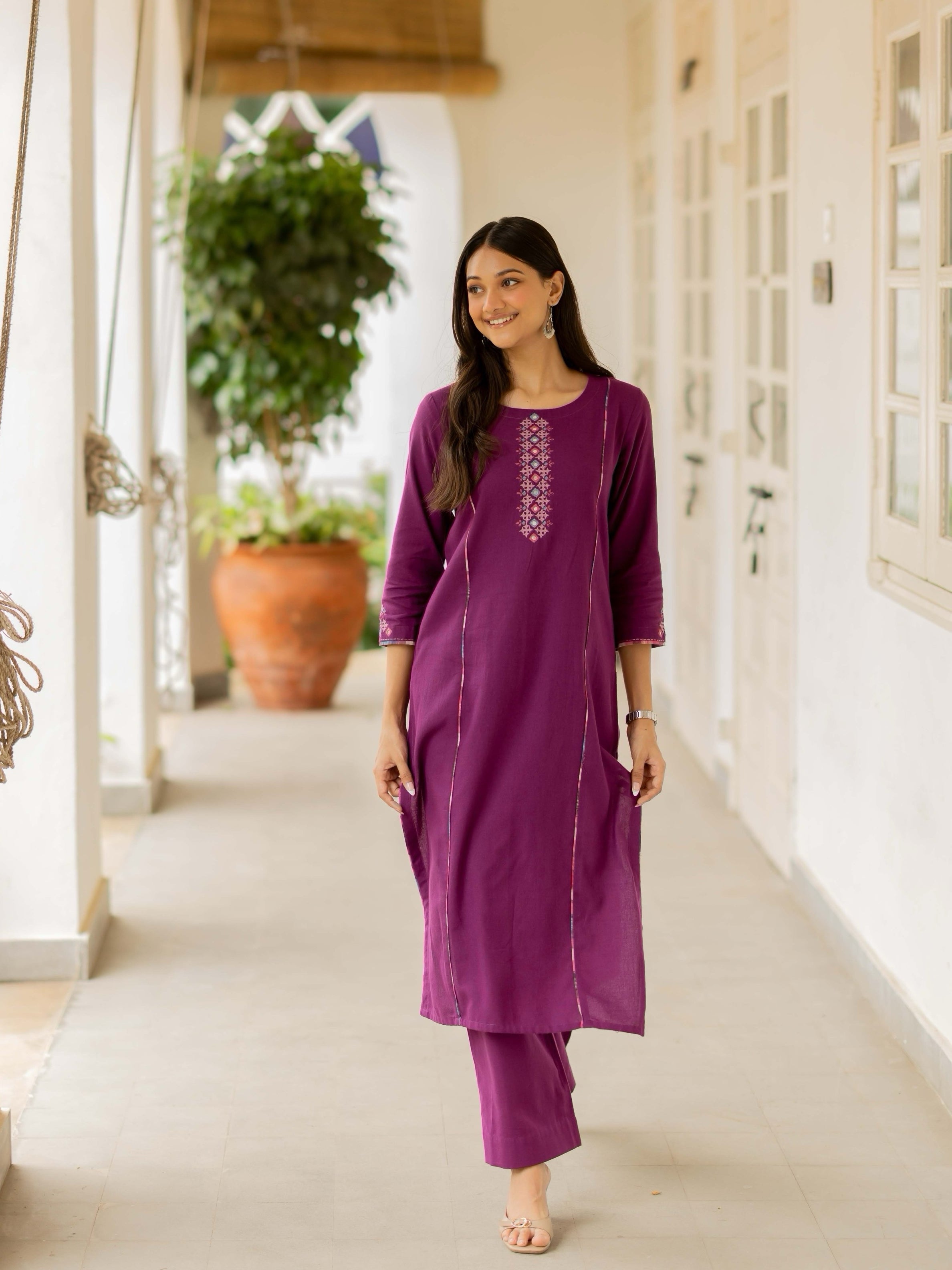 Straight fit cotton kurta with mirror work and hand block printed trim detailing