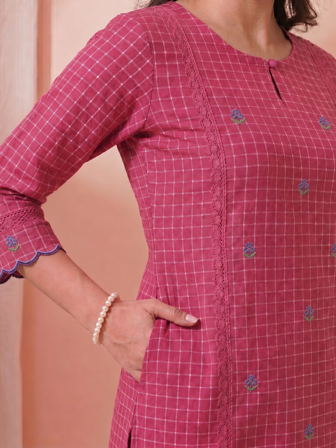 A-Line Cotton Checkered Kurta with Floral Embroidery & Lace Detailing.