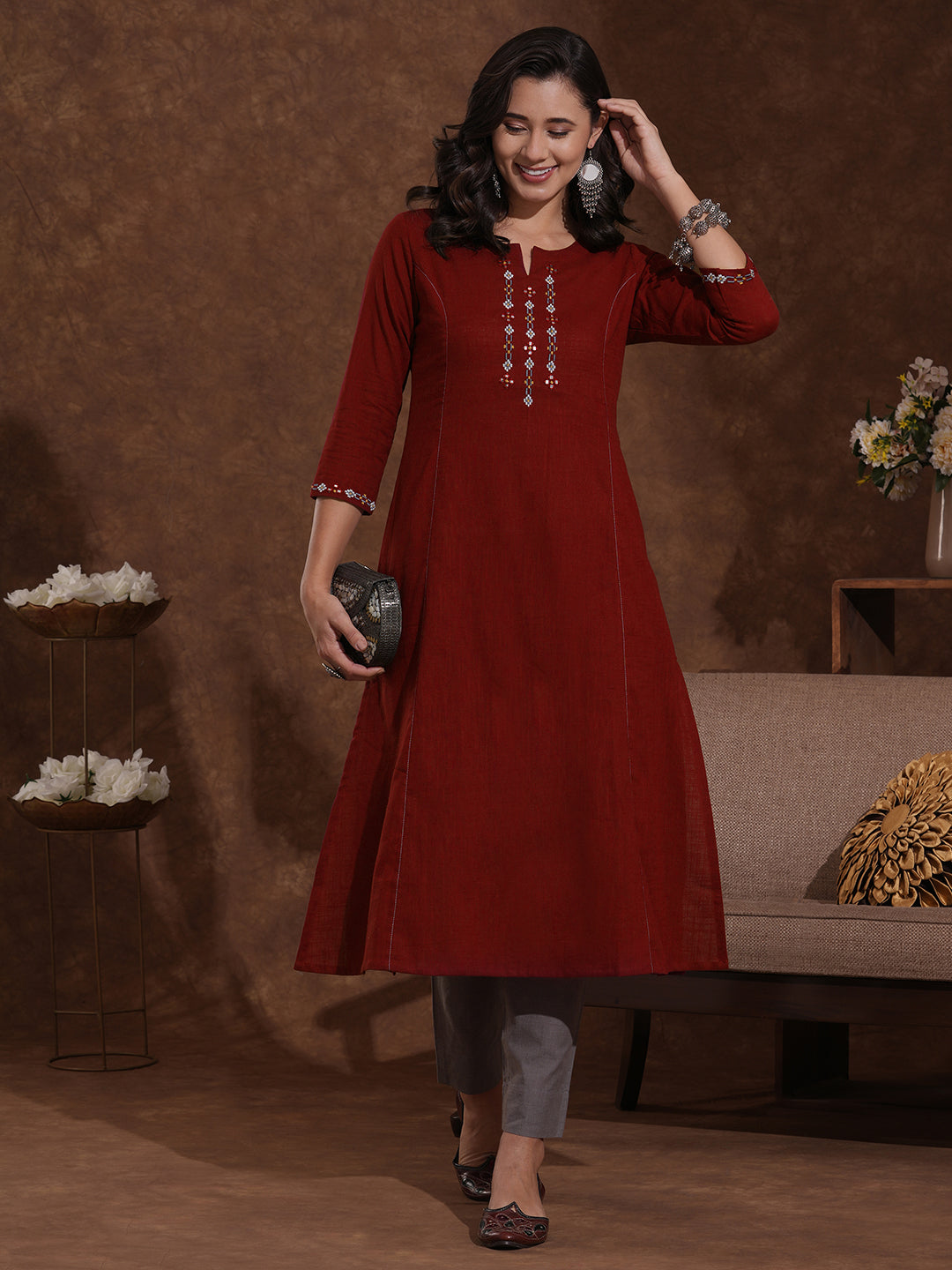 Pocketed cotton slurb kurta in an A-line fit with thread and mirror work.