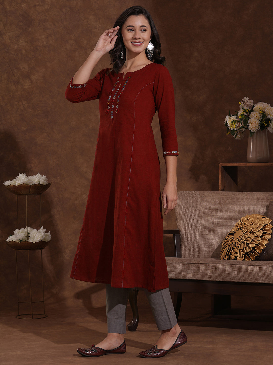 Pocketed cotton slurb kurta in an A-line fit with thread and mirror work.