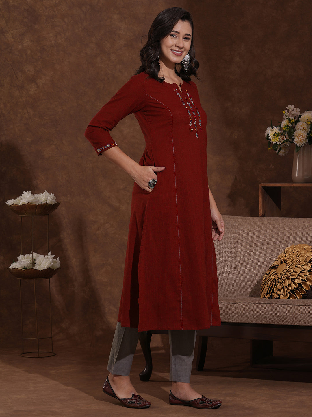 Pocketed cotton slurb kurta in an A-line fit with thread and mirror work.