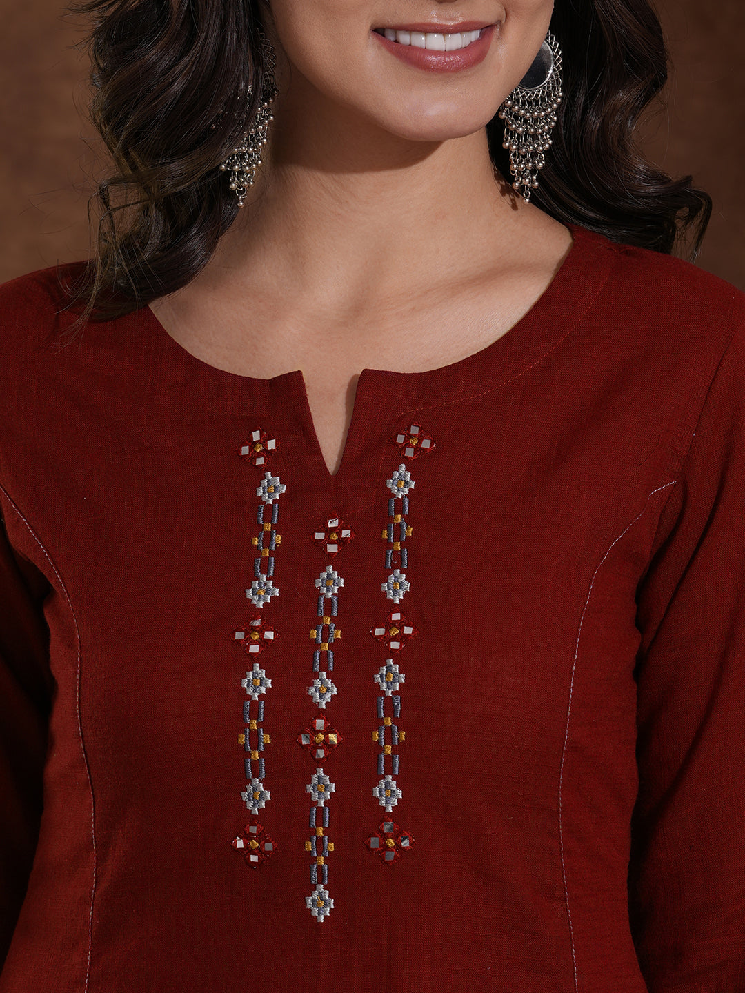 Pocketed cotton slurb kurta in an A-line fit with thread and mirror work.