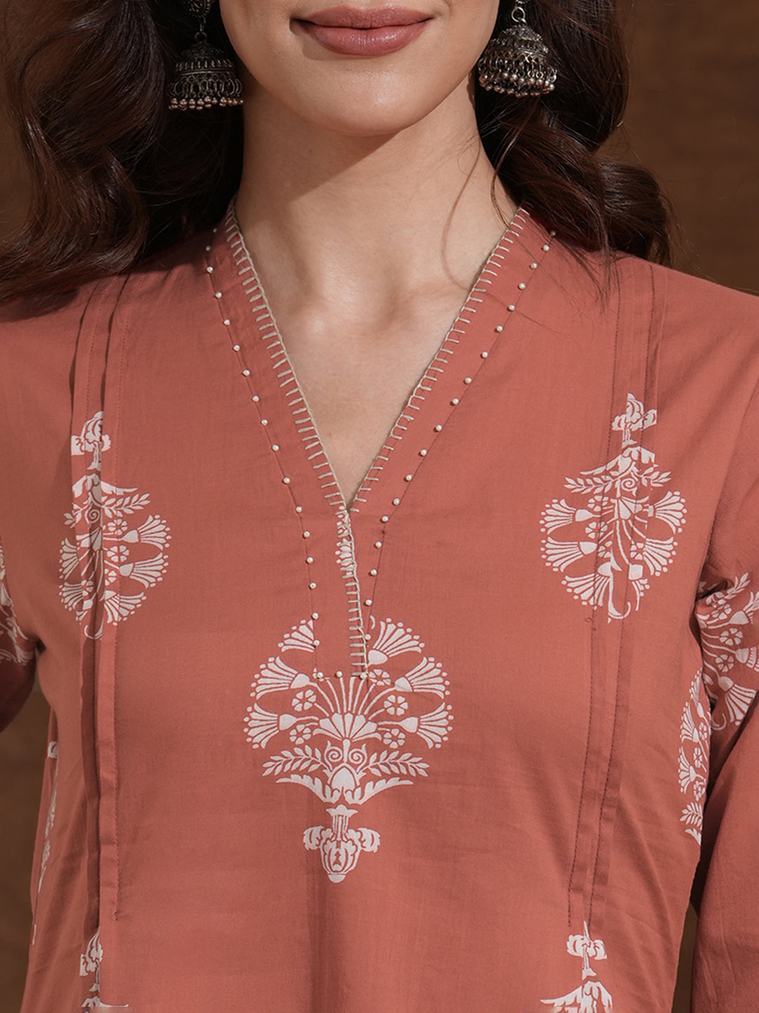 Rust Orange A-Line Cotton Print Kurta with Beadwork and Functional Pocket