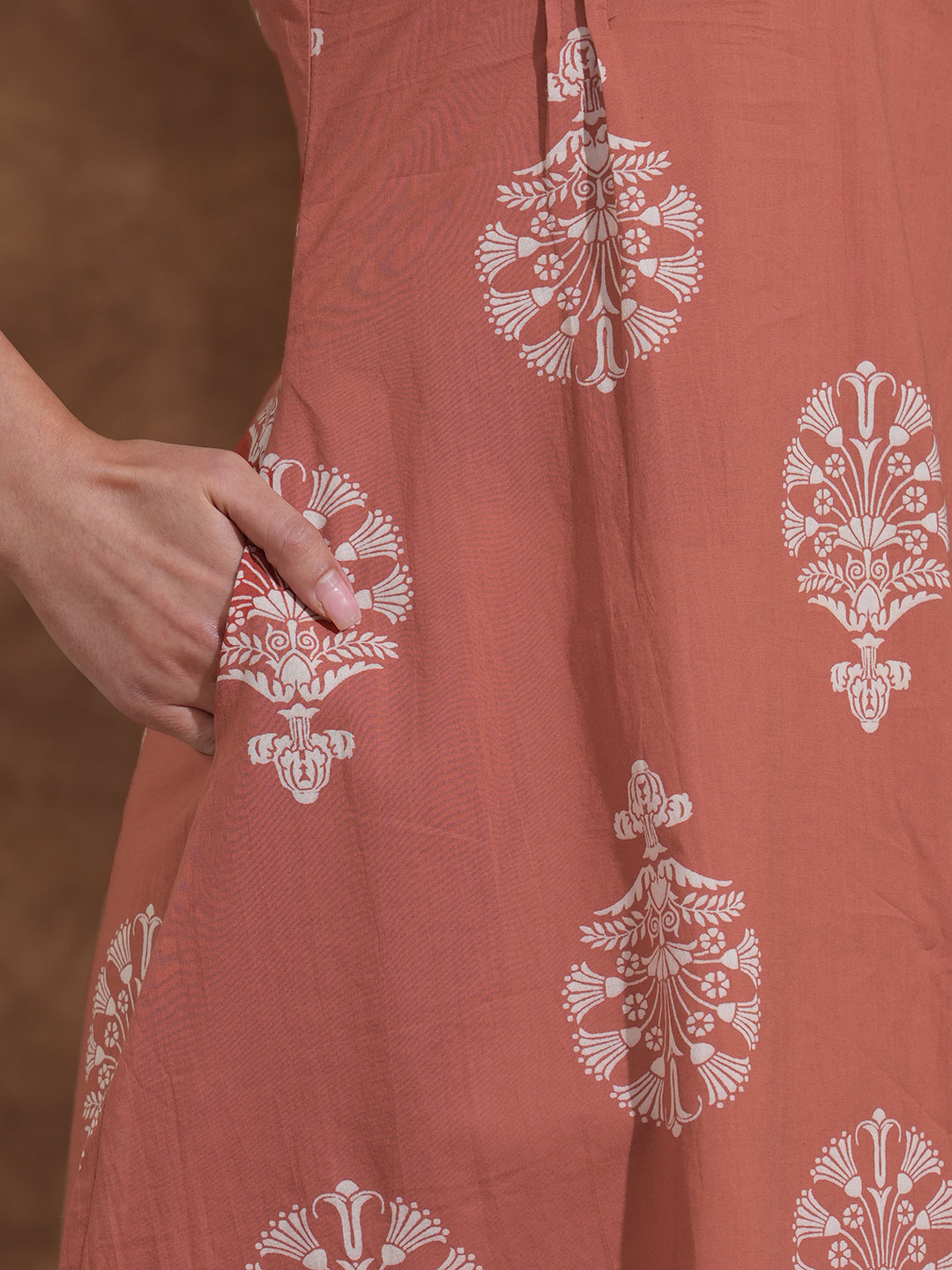 Rust Orange A-Line Cotton Print Kurta with Beadwork and Functional Pocket
