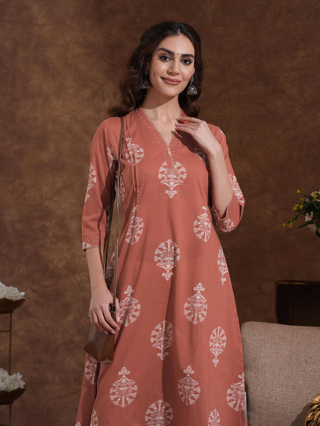 Rust Orange A-Line Cotton Print Kurta with Beadwork and Functional Pocket