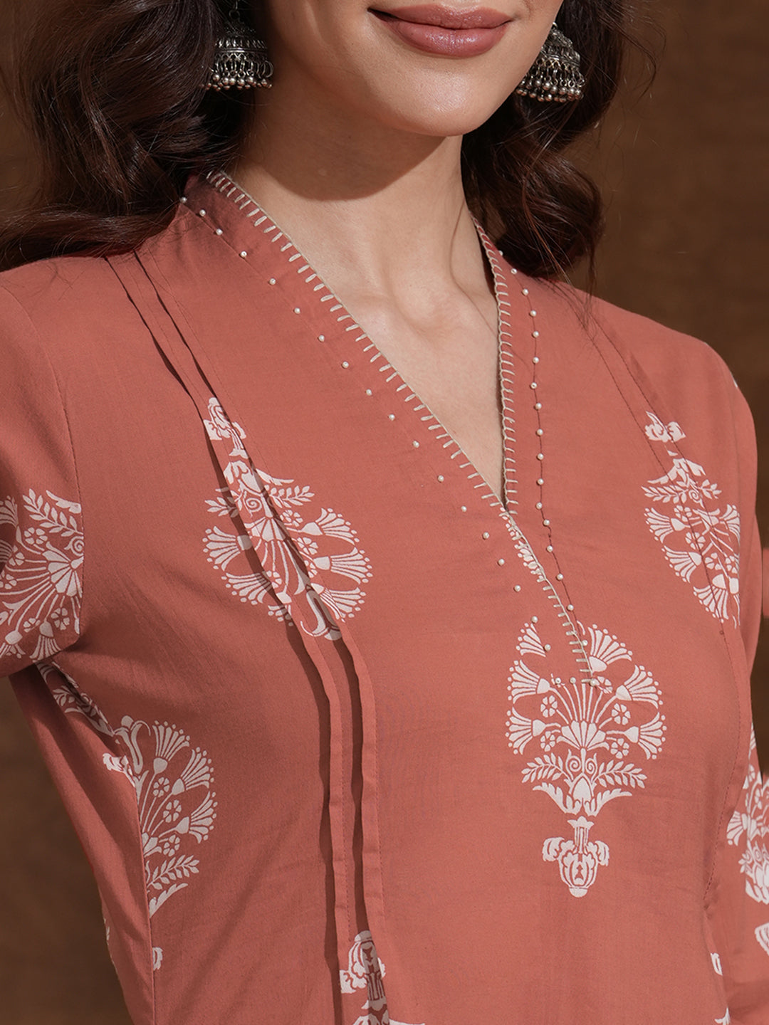 Rust Orange A-Line Cotton Print Kurta with Beadwork and Functional Pocket