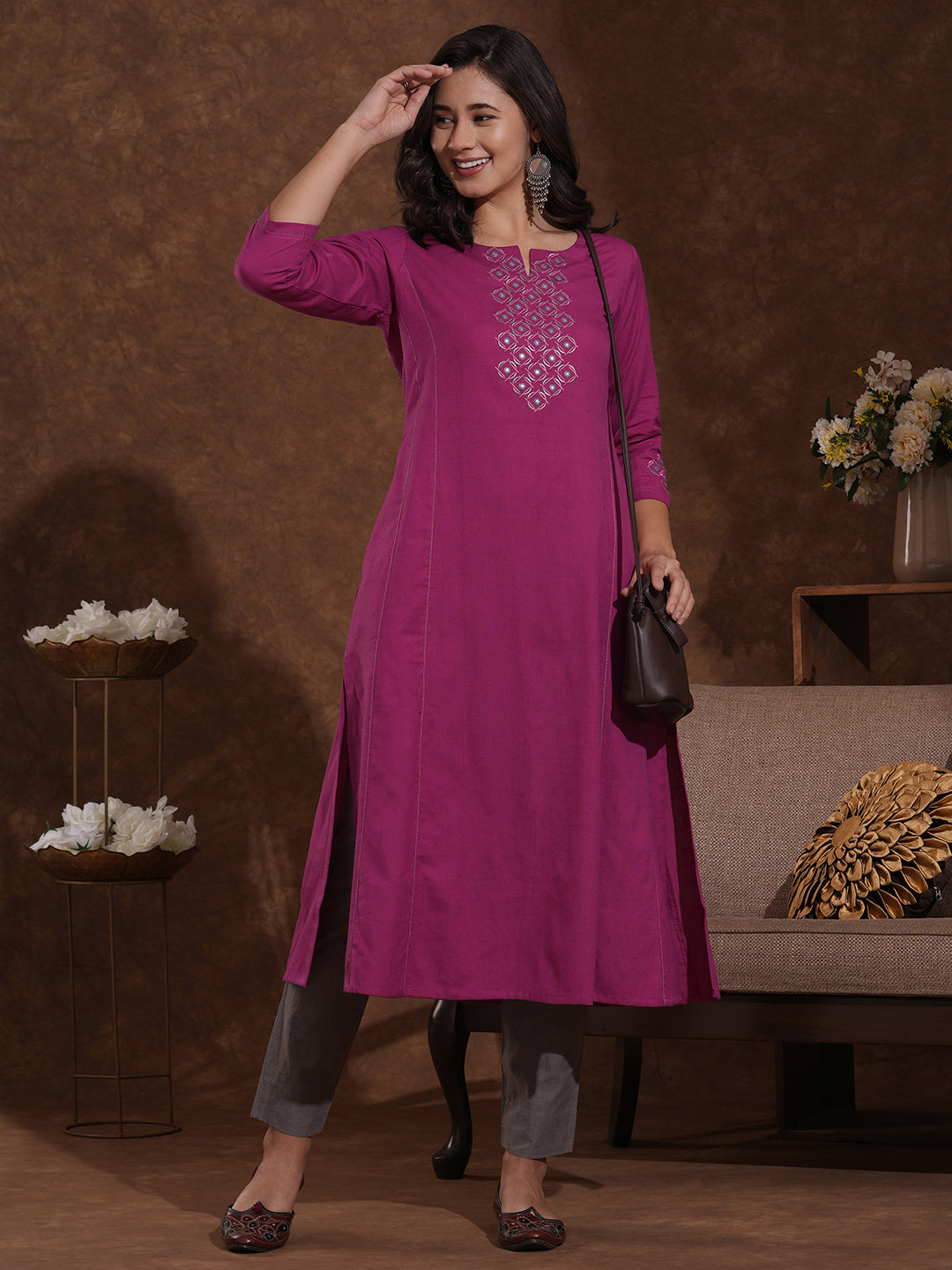 Embroidered fuchsia pink cotton flex kurta in an A line fit with inseam pocket.