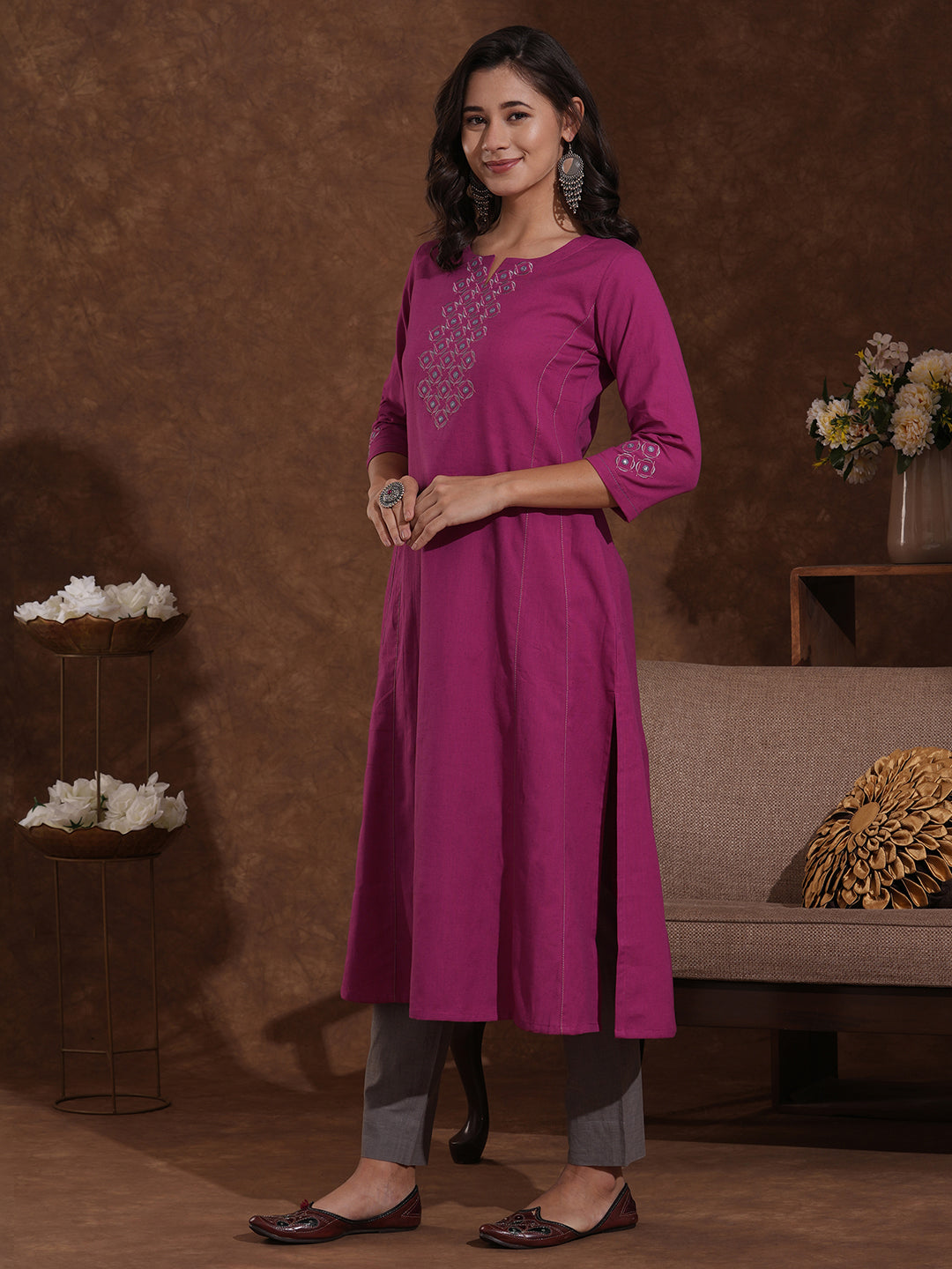 Embroidered fuchsia pink cotton flex kurta in an A line fit with inseam pocket.
