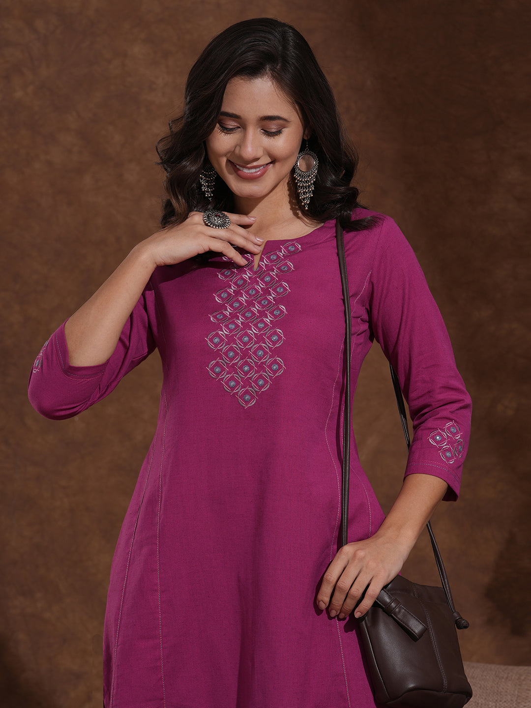 Embroidered fuchsia pink cotton flex kurta in an A line fit with inseam pocket.