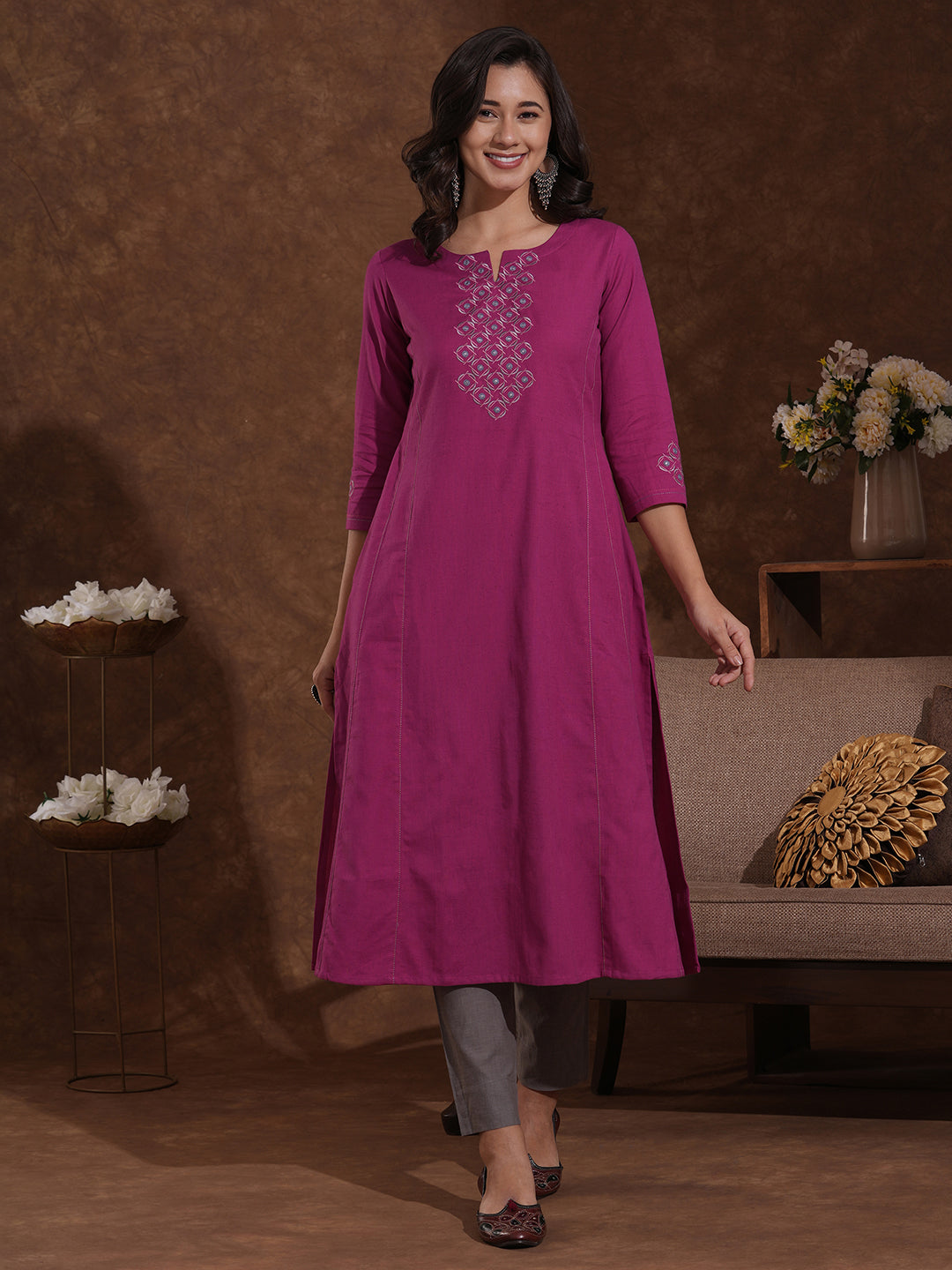 Embroidered fuchsia pink cotton flex kurta in an A line fit with inseam pocket.