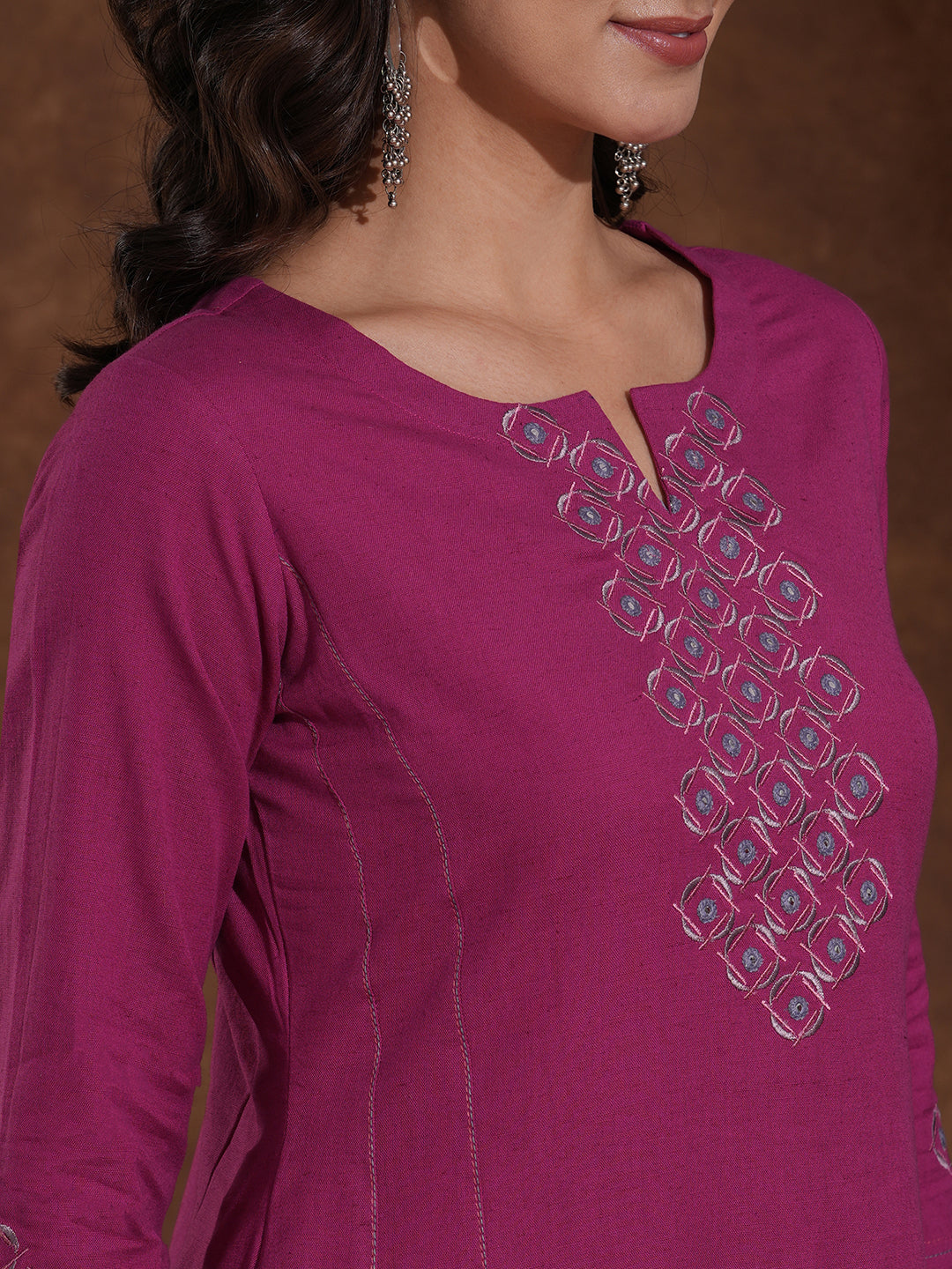 Embroidered fuchsia pink cotton flex kurta in an A line fit with inseam pocket.