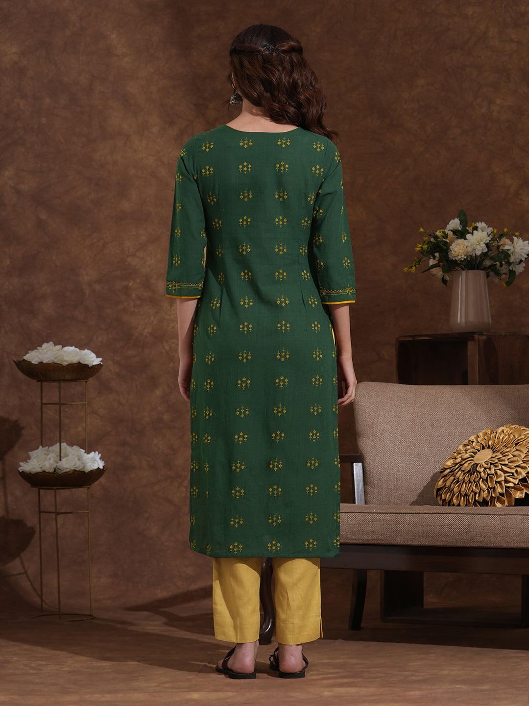 Straight fit cotton dobby kurta with hand embroidery and mirror work.