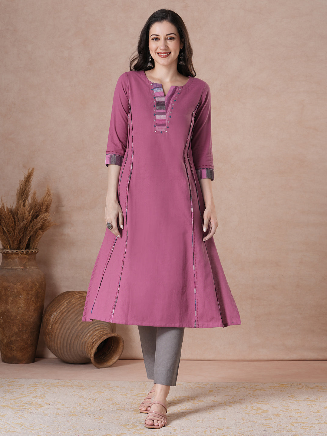 Women Solid A-Line Kurta with Contrast Panel Detail on Neckline.