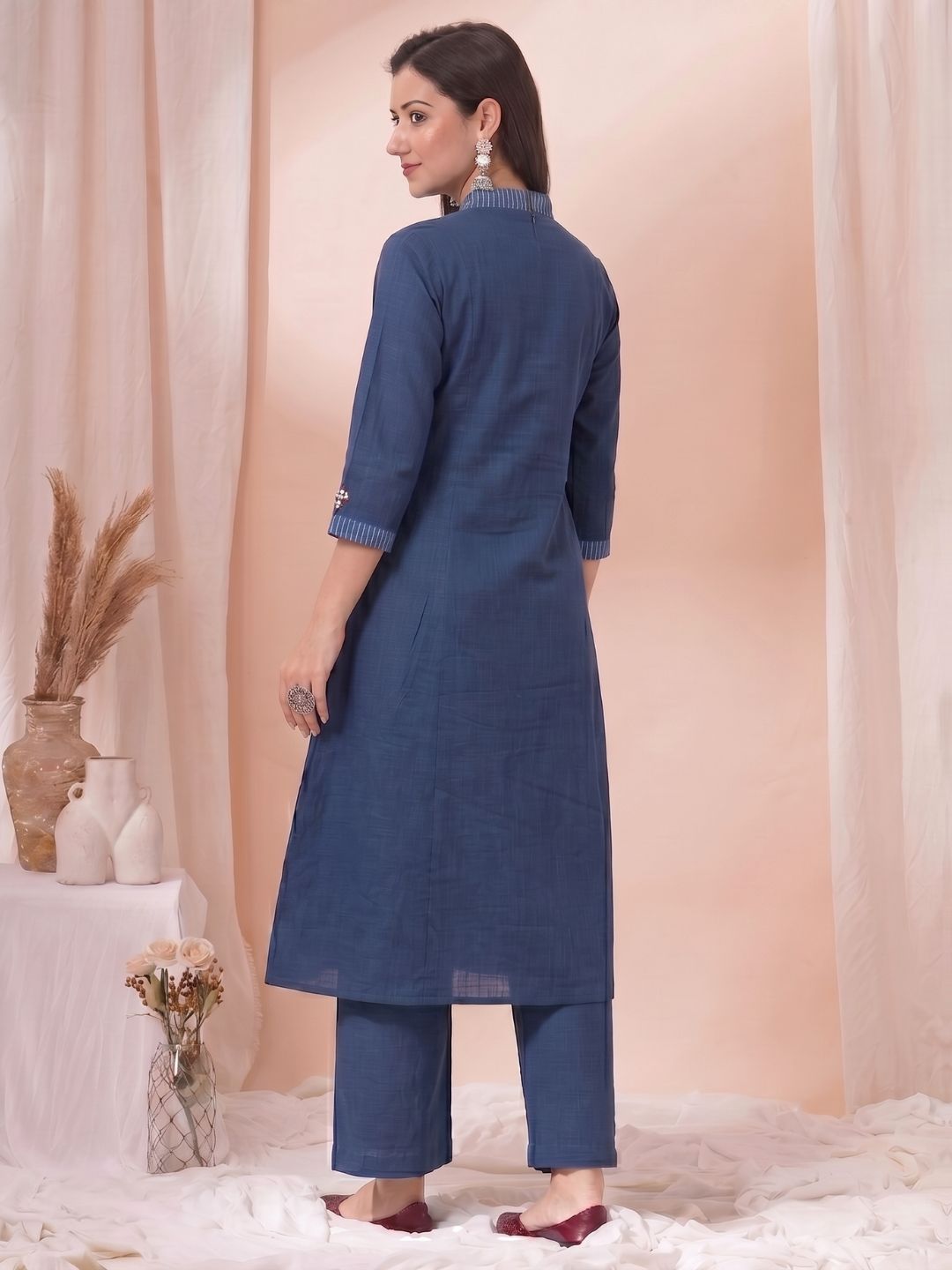 A-Line Cotton Kurta with Elegance Floral Embroidered Yoke and Contrast Piping Detailing.