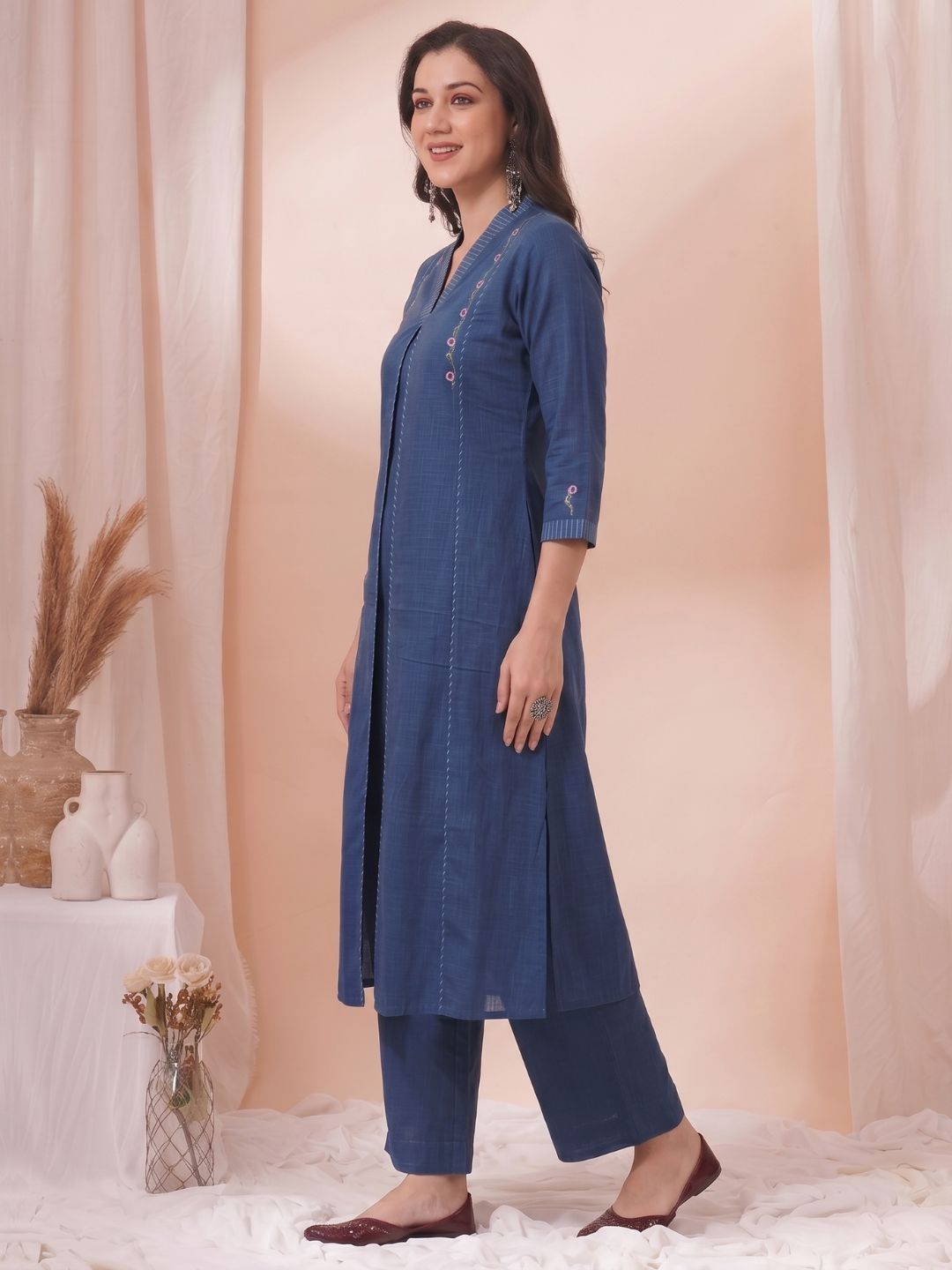 A-Line Cotton Kurta with Elegance Floral Embroidered Yoke and Contrast Piping Detailing.