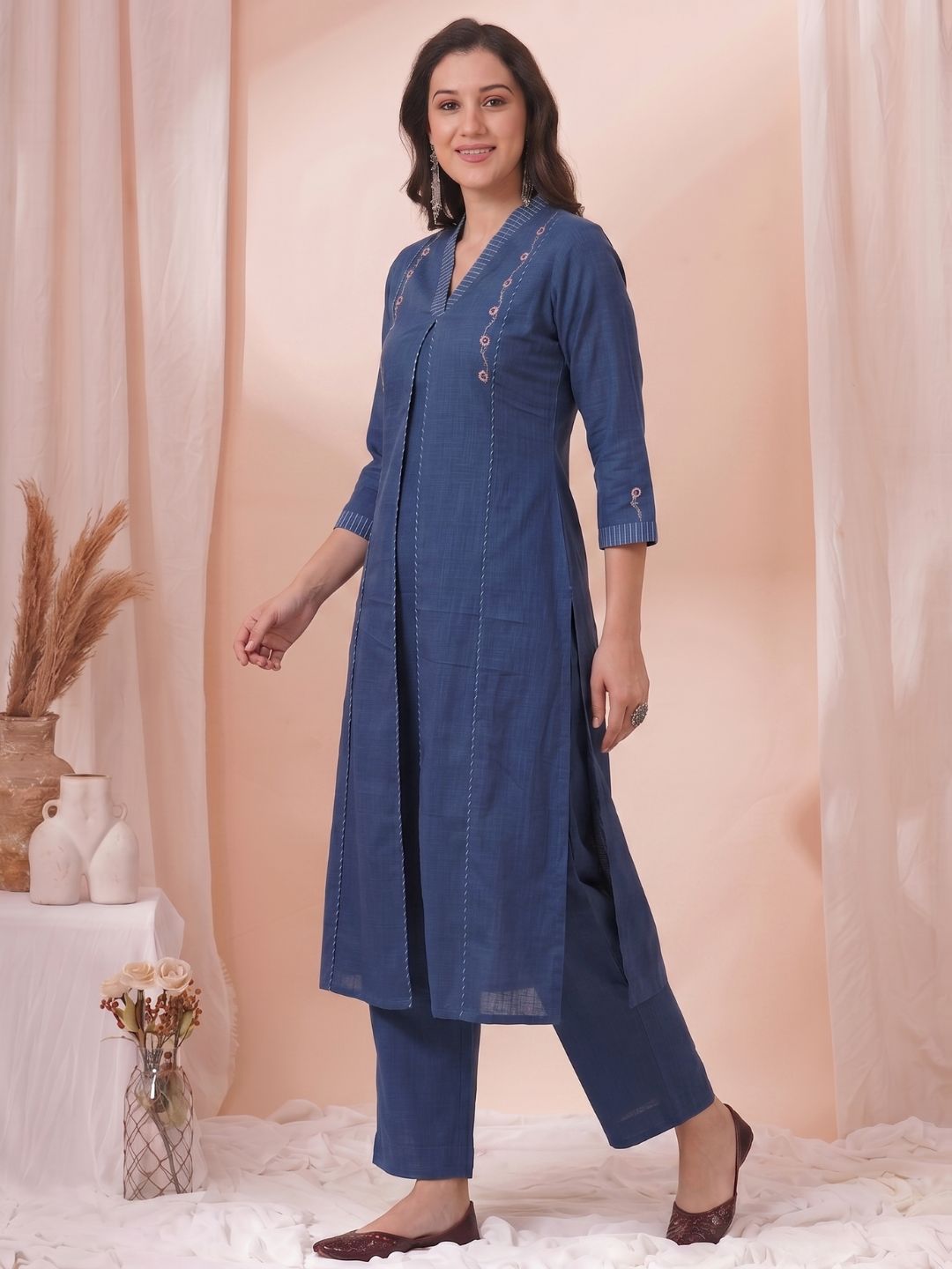 A-Line Cotton Kurta with Elegance Floral Embroidered Yoke and Contrast Piping Detailing.