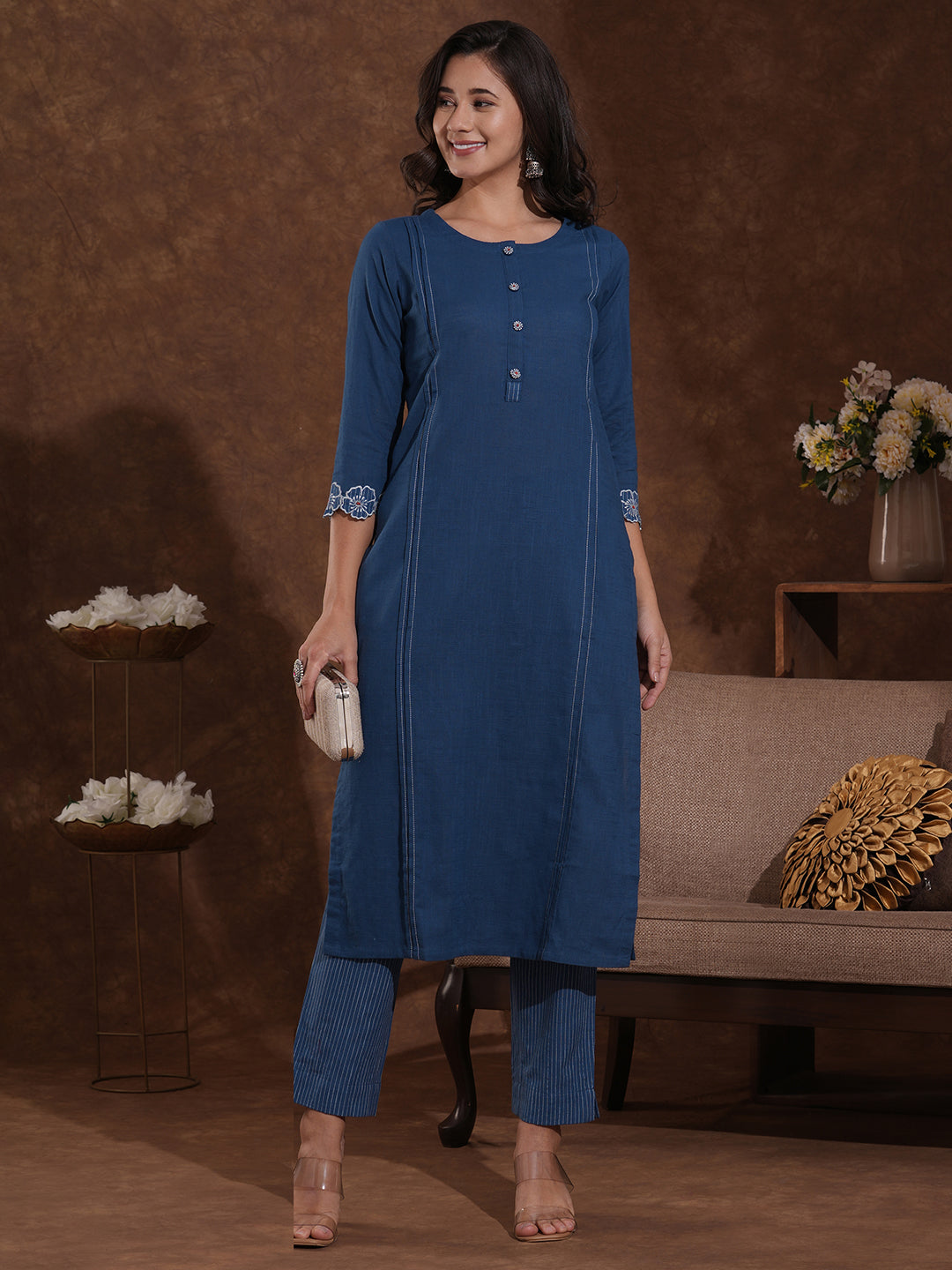 Straight fit cotton slurb kurta with cutwork embroidery.