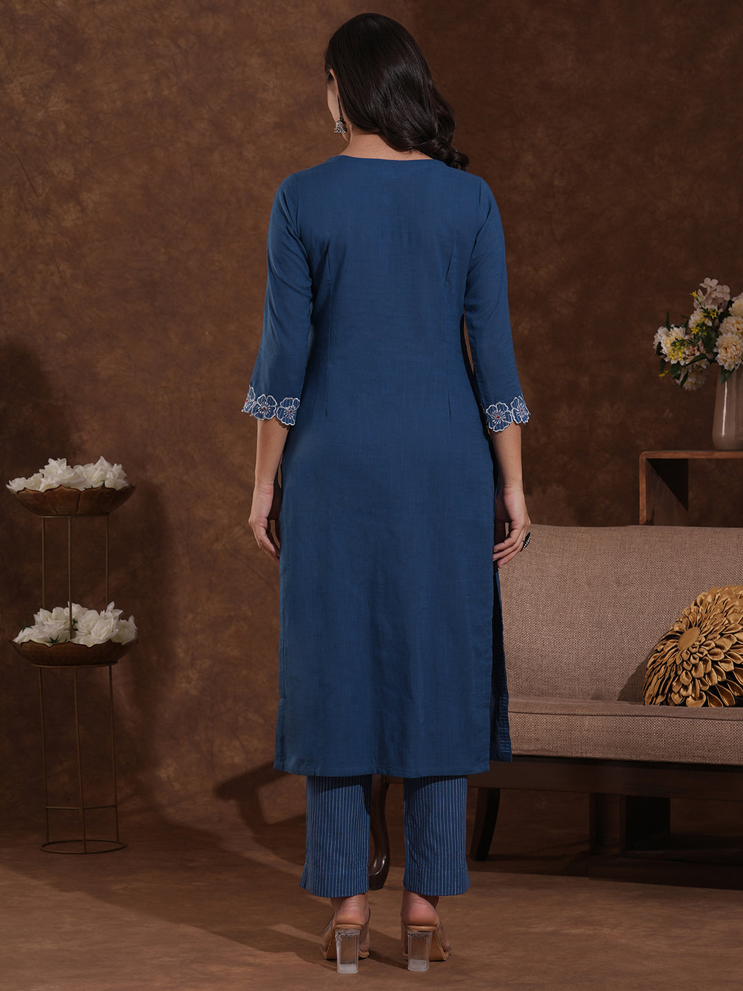 Straight fit cotton slurb kurta with cutwork embroidery.