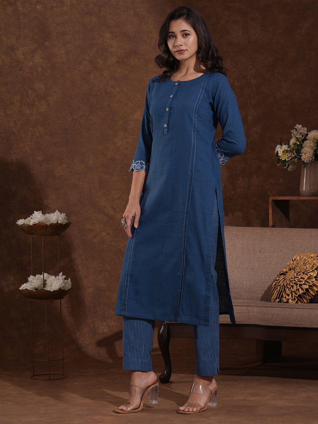 Straight fit cotton slurb kurta with cutwork embroidery.